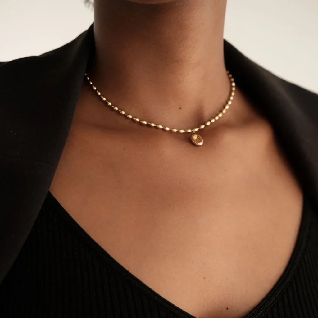 gold necklace to wear to a funeral