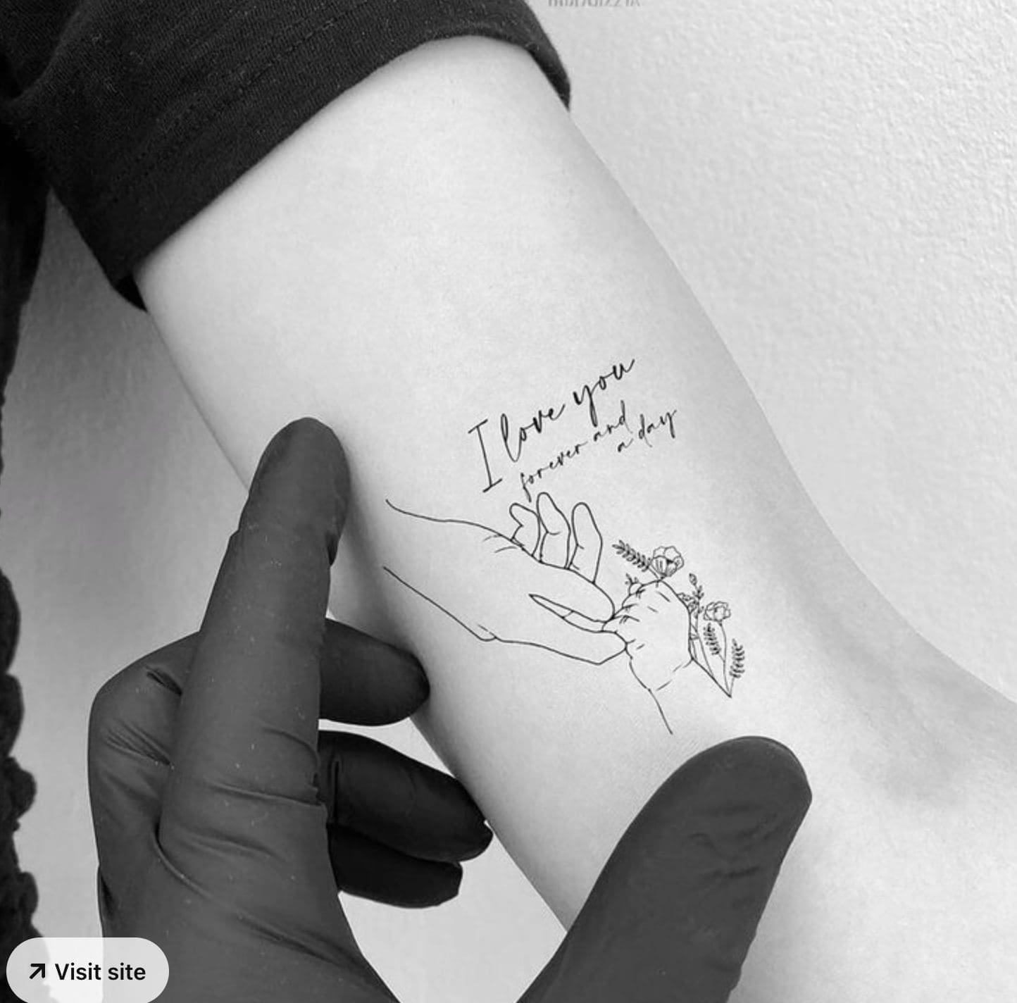 two hands holding memorial tattoo designs for mom