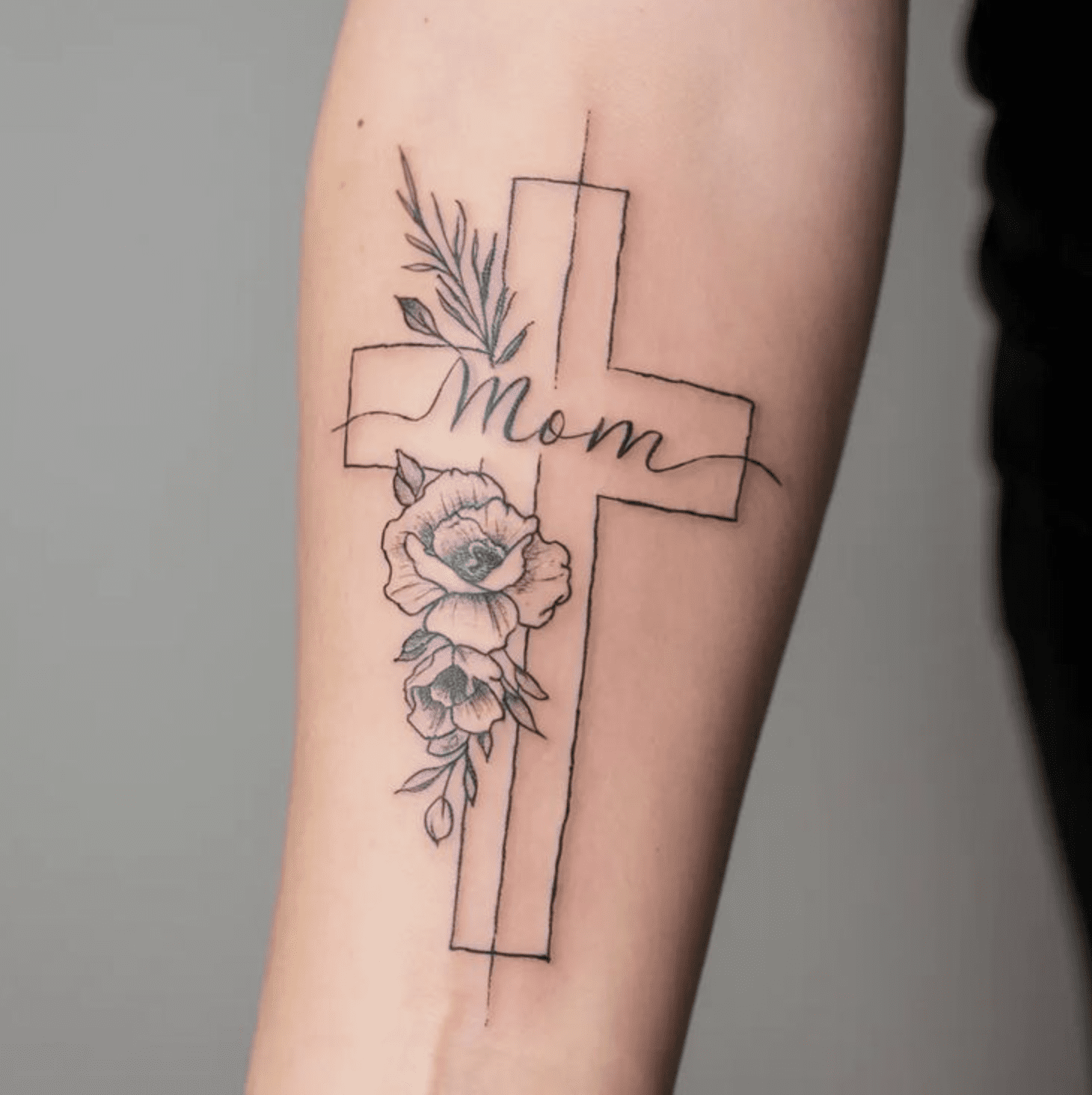 catholic cross with mom written on it